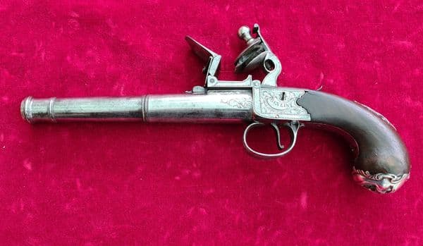 A fine English Queen Anne cannon barrel silver mounted flintlock pistol by Heylin . C.1780. Ref 3229